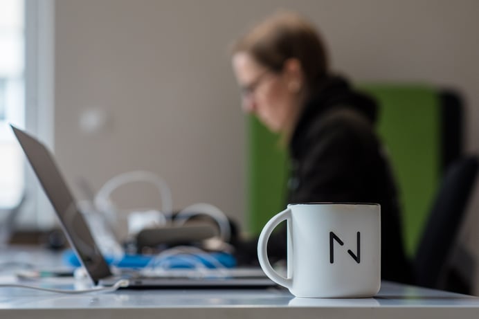 Women working by the laptop.