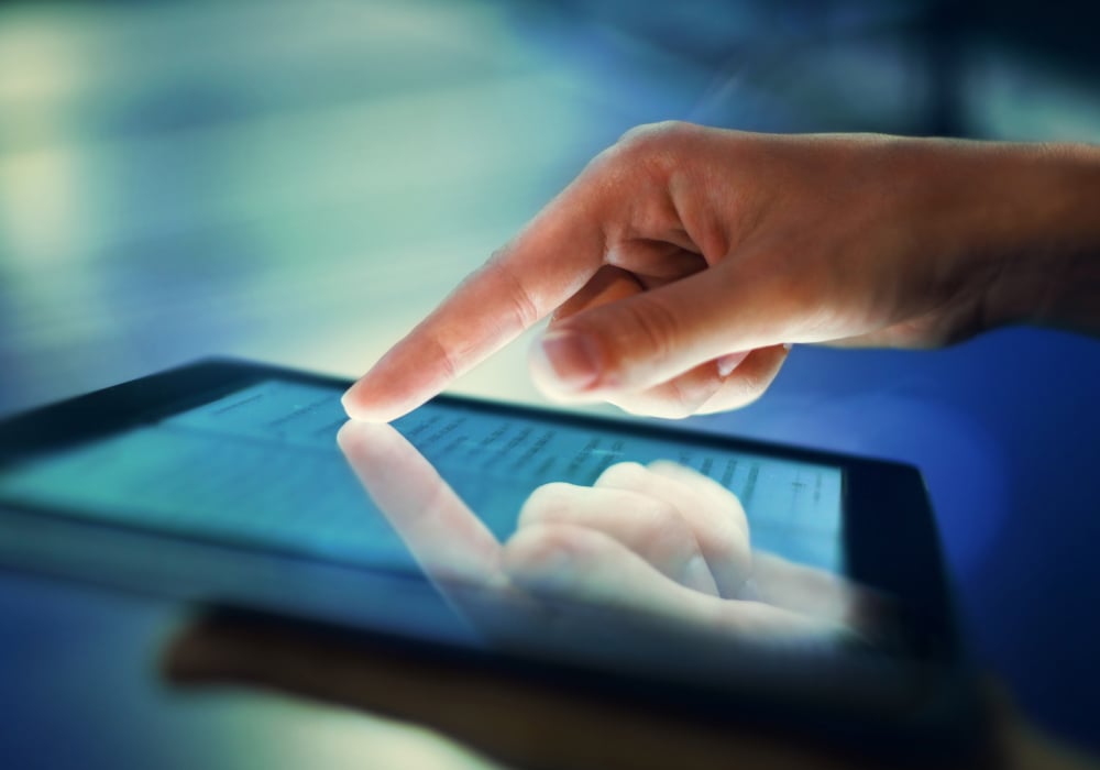 finger on the tablet