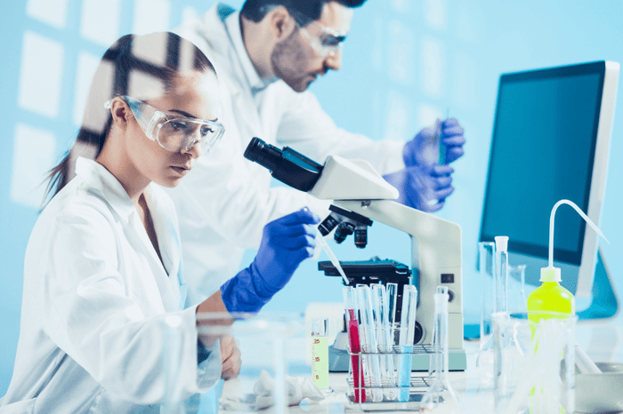 Two medical researchers in a laboratory.